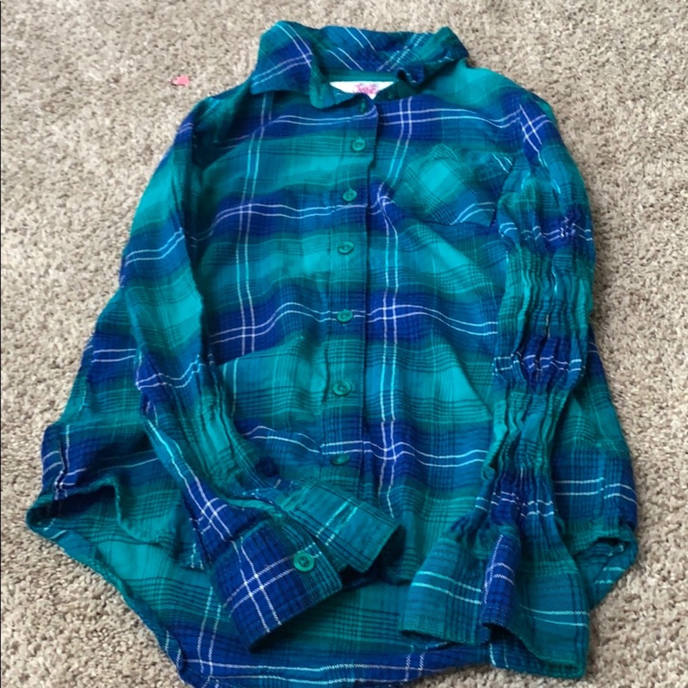 I’m selling this blue and green flannel.